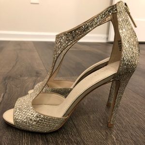 Gold David’s Bridal heels size 7. Wore only once at a wedding! Heel is 3.5”